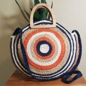 Multi colored straw handbag.